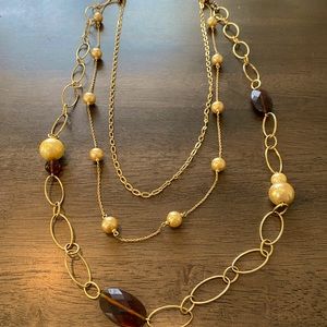 Multilayered gold necklace